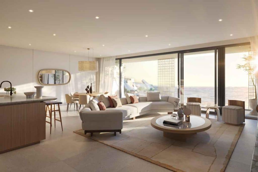 Master bedroom interior at Nobu Residences on Saadiyat Island, Abu Dhabi, showcasing elegant organic textures and ocean views.
