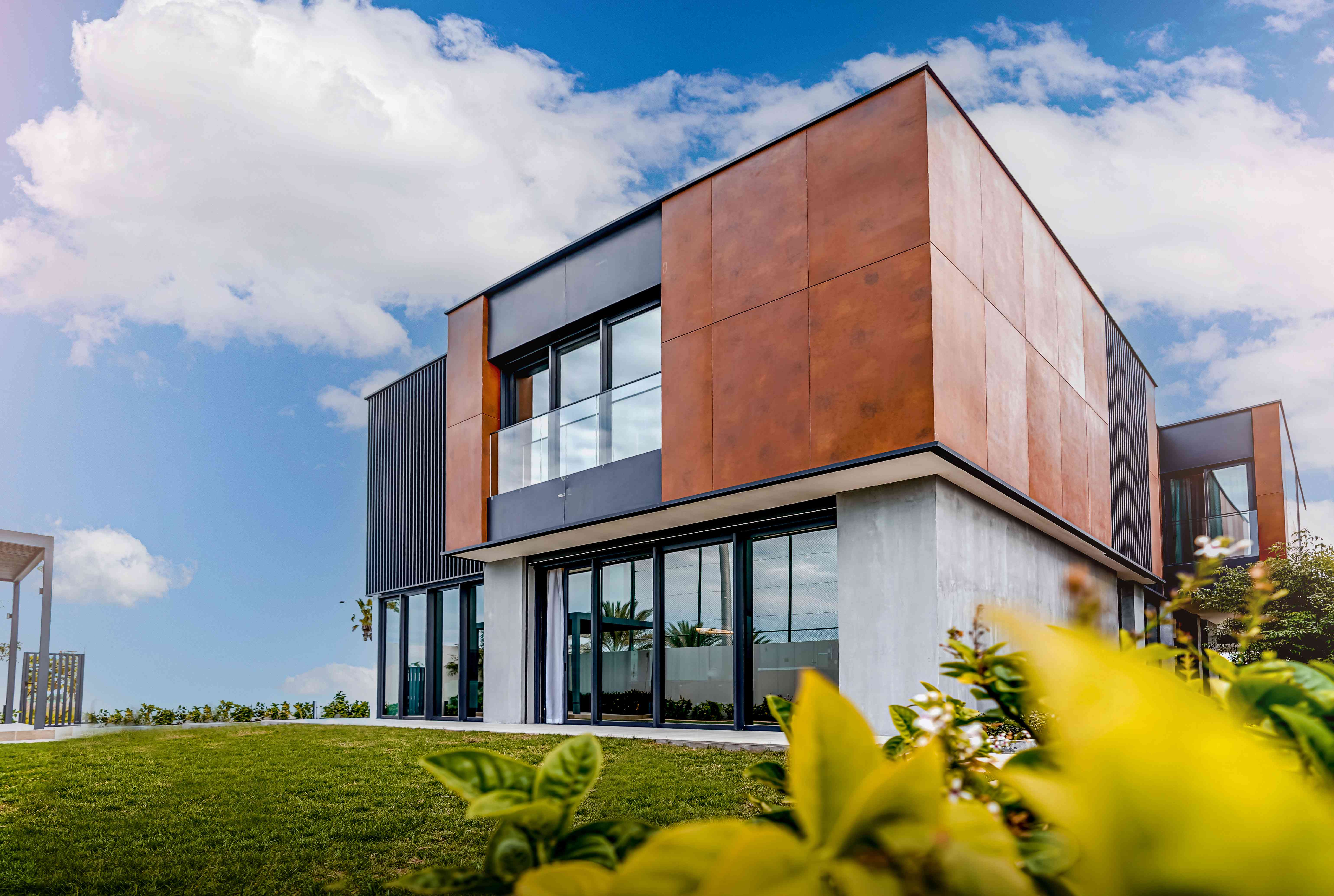 Panoramic exterior view of Saadiyat Lagoons villas against the Abu Dhabi skyline